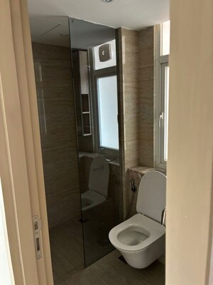 Bathroom in 3.5 BHK Apartment at DLF Gardencity Enclave, Sector 93 – for Rent