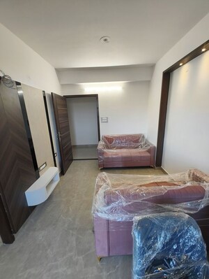 Living Room in 1 BHK Apartment at Vardhman Empire Estate, Mahapura – for Rent