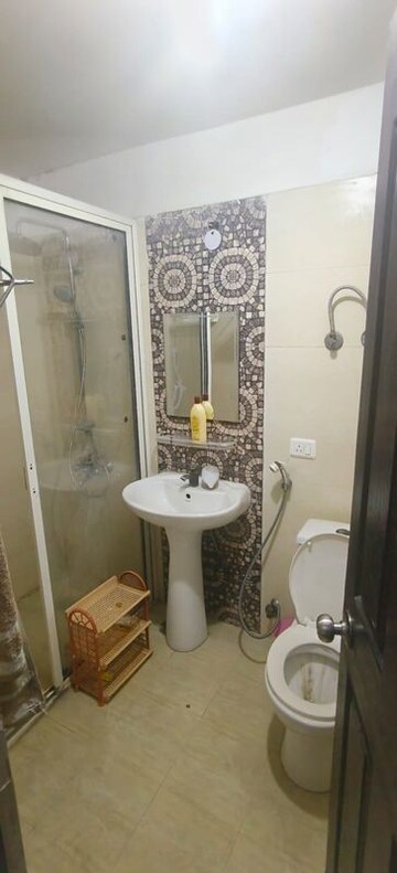 Bathroom in 2 BHK Apartment at Prateek Wisteria, Sector 77 – for Rent