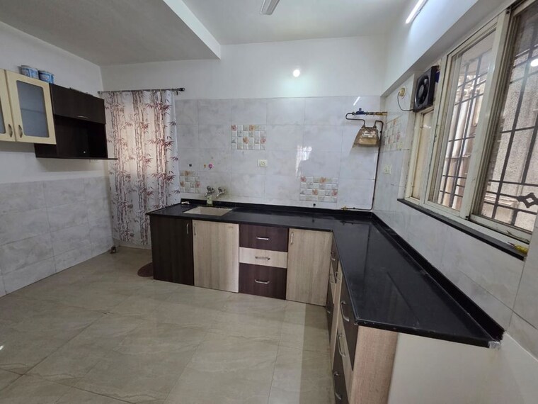 Kitchen, astha-baner 3 Bedroom 1200 Sq.Ft. Apartment In Baner Pune 9971138