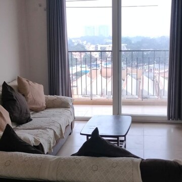 Living Room in 2.5 BHK Apartment at Bhartiya Nikoo Homes Phase 2, Kannur – for Rent