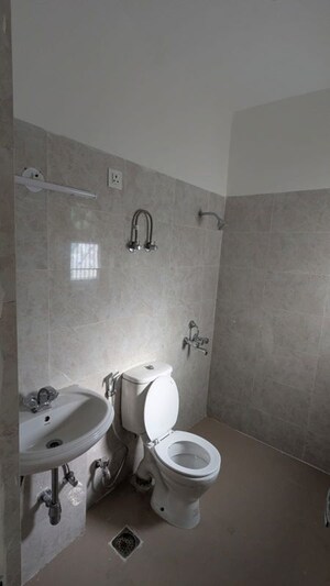 Bathroom in 4 BHK Builder Floor at Sector 77 – for Rent