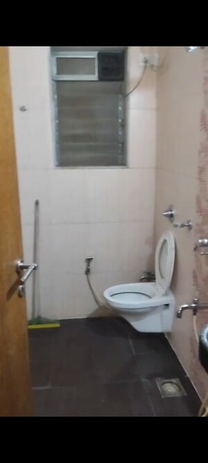 Bathroom in 2 BHK Apartment at Soham Garden, Manpada – for Rent