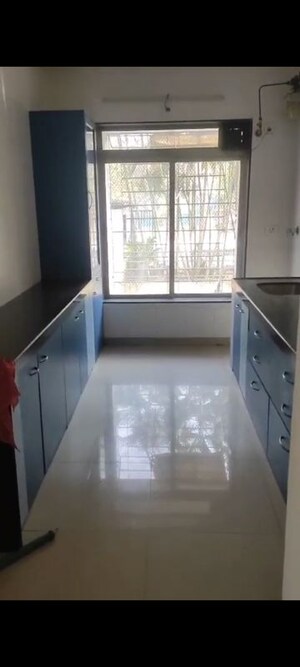 Kitchen in 2 BHK Apartment at Soham Garden, Manpada – for Rent