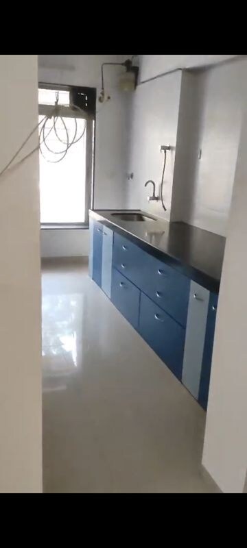 Kitchen in 2 BHK Apartment at Soham Garden, Manpada – for Rent