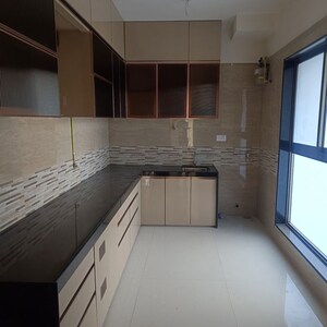 Kitchen in 2 BHK Apartment at Raj Infinia, Malad West – for Sale