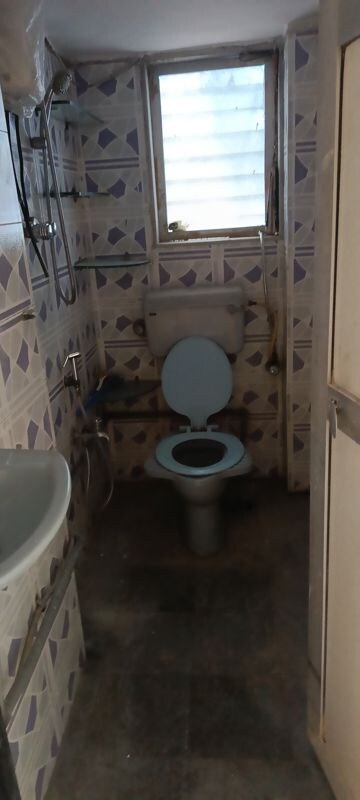 Bathroom in 2 BHK Apartment at Model Town, Andheri West – for Rent