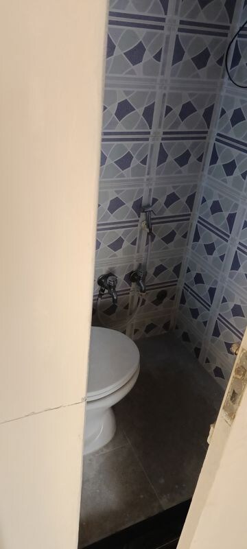 Bathroom in 2 BHK Apartment at Model Town, Andheri West – for Rent