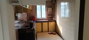 Kitchen in 2 BHK Apartment at Model Town, Andheri West – for Rent