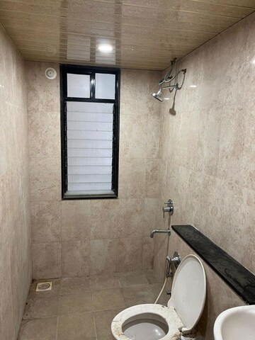 Bathroom in 3 BHK Apartment at Pride World City Brooklyn, Charholi Budruk – for Rent