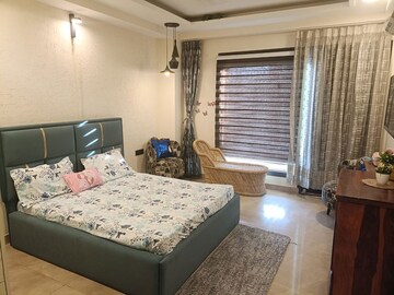 Bedroom in 3 BHK Builder Floor at Ansal API Esencia, Sector 67 – for Rent