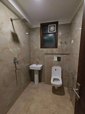 Bathroom in 2 BHK Builder Floor at Chattarpur – for Sale
