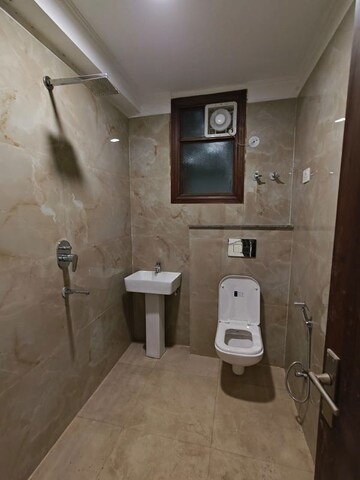 Bathroom in 2 BHK Builder Floor at Chattarpur – for Sale