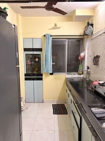 Kitchen in 1 BHK Apartment at The Kamal Sagar CHS, Bhandup East – for Sale