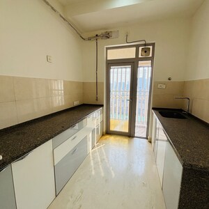 Kitchen in 2 BHK Apartment at Kalpataru Elitus, Asha Nagar – for Rent