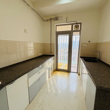 Kitchen in 2 BHK Apartment at Kalpataru Elitus, Asha Nagar – for Rent