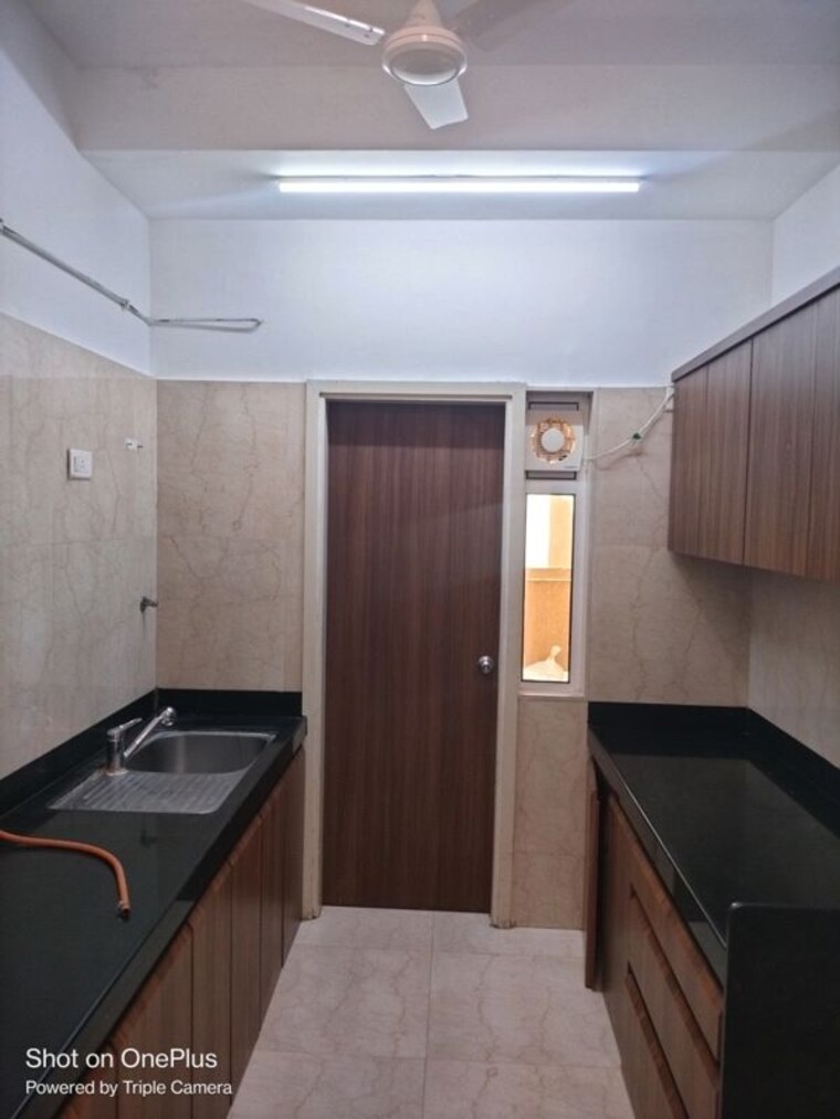 Kitchen, lnt-crescent-bay-t4 2 Bedroom 850 Sq.Ft. Apartment In Parel Mumbai 9971435