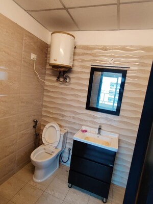 Bathroom in 3 BHK Apartment at Elite Golf Green, Sector 79 – for Sale