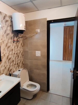 Bathroom in 3 BHK Apartment at Elite Golf Green, Sector 79 – for Sale