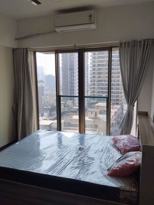 Bedroom in 2 BHK Apartment at Chandak Cornerstone, Worli – for Rent