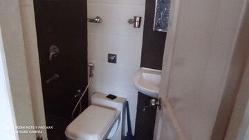 Bathroom in 1 BHK Apartment at Vijay Galaxy, Waghbil – for Rent