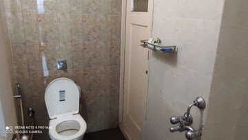 Bathroom in 1 BHK Apartment at Vijay Galaxy, Waghbil – for Rent