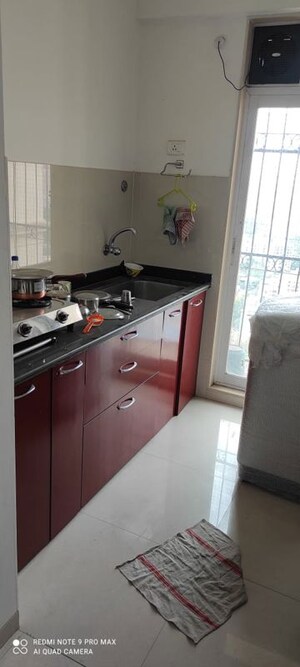 Kitchen in 1 BHK Apartment at Vijay Galaxy, Waghbil – for Rent