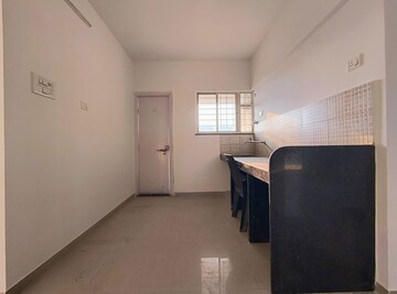 Kitchen in 2 BHK Apartment at Jalan Aura County Pune, Wagholi – for Rent