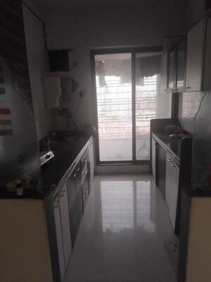 Kitchen in 2 BHK Apartment at Paras Dev Paradise Mira, Mira Road – for Rent