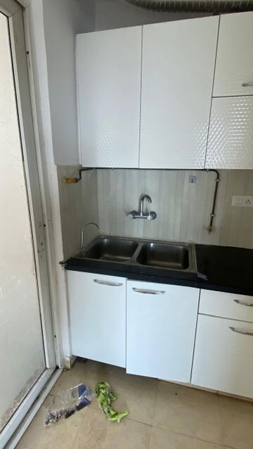 Kitchen in 3 BHK Apartment at Purvanchal Royal City, Chi V Greater Noida – for Sale