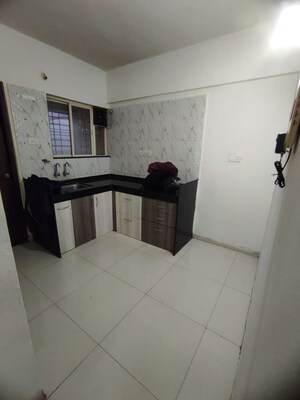 Kitchen in 2 BHK Apartment at Natraj Vela Enclave, Dhanori – for Rent