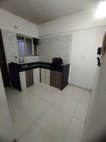 Kitchen in 2 BHK Apartment at Natraj Vela Enclave, Dhanori – for Rent