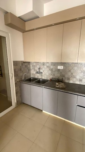 Kitchen in 3 BHK Apartment at Purvanchal Royal City, Chi V Greater Noida – for Rent