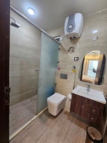 Bathroom in 4 BHK Builder Floor at Ansal API Versalia, Sector 67a – for Rent