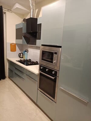 Kitchen in 4 BHK Builder Floor at Ansal API Versalia, Sector 67a – for Rent