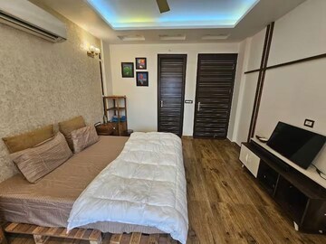 Bedroom in 4 BHK Builder Floor at Ansal API Versalia, Sector 67a – for Rent