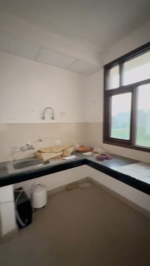 Kitchen in 2.5 BHK Builder Floor at Wave Floors, Mahurali – for Sale