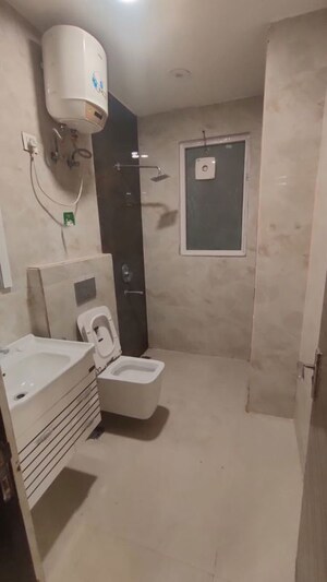 Bathroom in 4 BHK Builder Floor at Ansal API Versalia, Sector 67a – for Rent