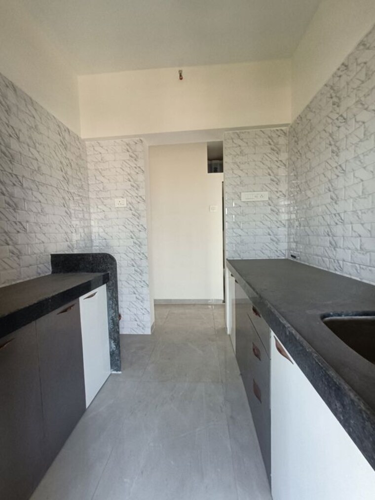 Kitchen, shree-ostwal-horizon 2 Bedroom 700 Sq.Ft. Apartment In Mira Road Thane 9643253