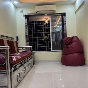 Living Room in 1 RK Apartment at Hirani Shree Siddhi Bldg No 69 , Nehru Nagar – for Sale