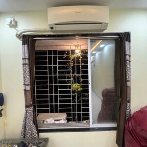 Living Room in 1 RK Apartment at Hirani Shree Siddhi Bldg No 69 , Nehru Nagar – for Sale