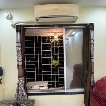 Living Room in 1 RK Apartment at Hirani Shree Siddhi Bldg No 69 , Nehru Nagar – for Sale