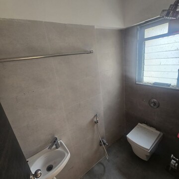 Bathroom in 1 BHK Apartment at Hirani Samruddhi Elegance, Nehru Nagar – for Rent