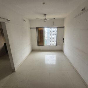 Living Room in 1 BHK Apartment at Hirani Samruddhi Elegance, Nehru Nagar – for Rent
