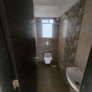 Bathroom in 1 BHK Apartment at Hirani Samruddhi Elegance, Nehru Nagar – for Rent