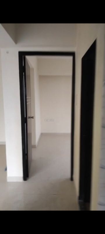 Building Lobby in 2 BHK Apartment at New Neelam CHS, Andheri West – for Rent