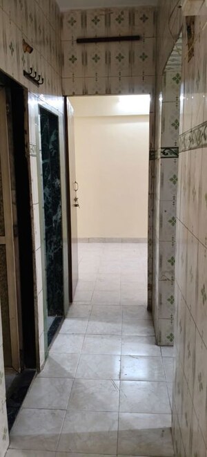 Building Lobby in 1 BHK Apartment at Shelter CHS, Nerul – for Rent