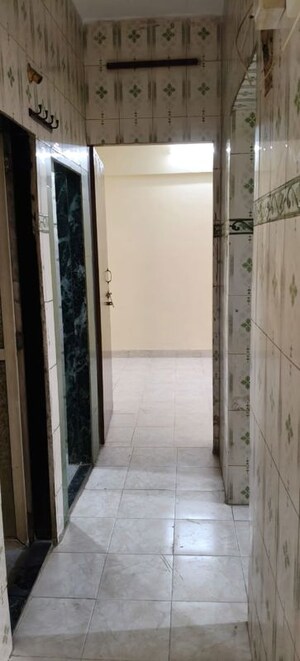 Building Lobby in 1 BHK Apartment at Shelter CHS, Nerul – for Rent