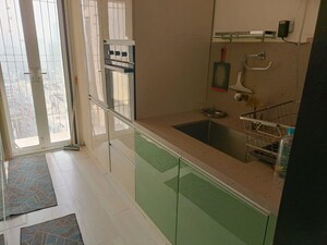 Kitchen in 3 BHK Apartment at Romell Diva, Malad West – for Sale