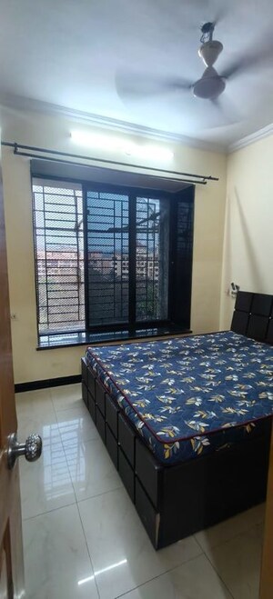 Bedroom in 2 BHK Apartment at Shreeji Plaza Nerul, Nerul Sector 23 – for Rent